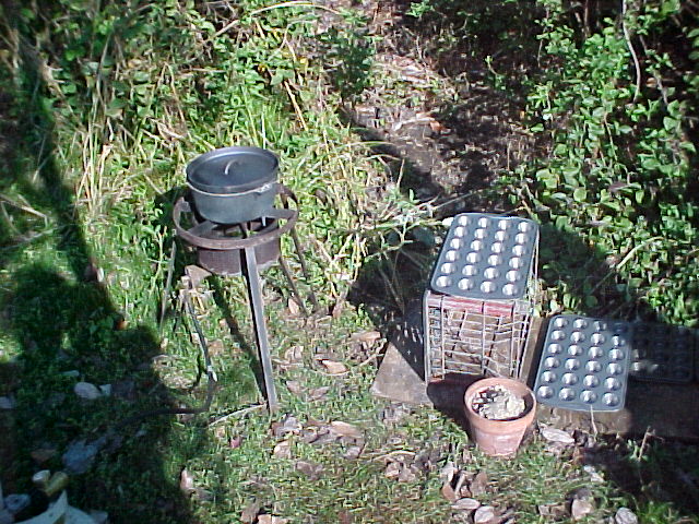 melting firing range bullet casing in a large cast iron pot and a turkey fryer cooker/burner